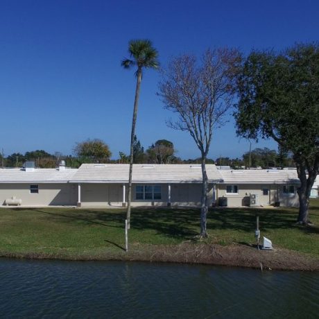 back view of clubhouse and lake