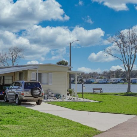 mobile home next to lake